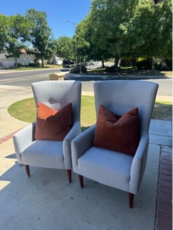 2 gray accent chairs