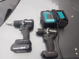 2 Makita 18v drills battery and charger
