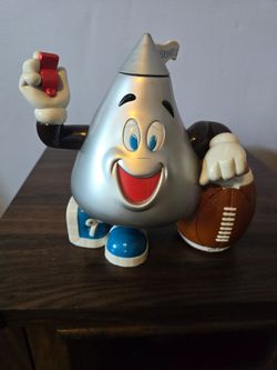 vintage 1999 Hershey's Kiss football referee candy dispenser.