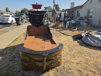 Twin pirate bed comes with night stand book case and dresser