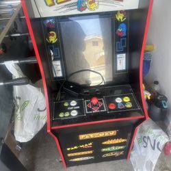 Arcade1Up Pac-Man arcade machine with riser and seat cover