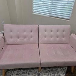 Pink futon couch with usb power