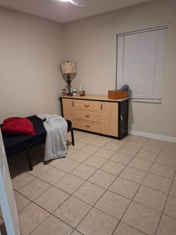 Wood and Black Dresser with Drawers and twin mattress and bed frame
