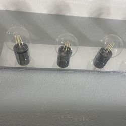 Wall light fixture for bathroom counter