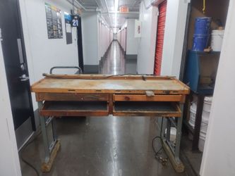 Two sided wooded benches for jewelers