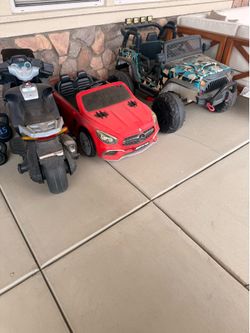 Two kids cars and one electric bike