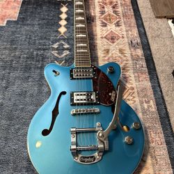 Gretsch Streamliner electric guitar, likely a G2657T Streamliner Center Block Jr. in Ocean Turquoise