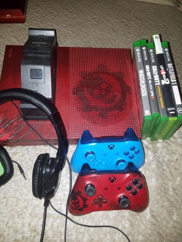 Xbox 1s 2TB gears of war edition with games controllers charging dock with batteries and head set