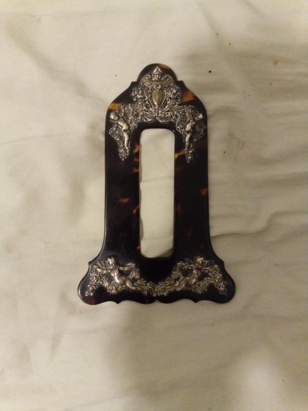ANTIQUE STERLING SILVER AND TORTOISE FRAME ?