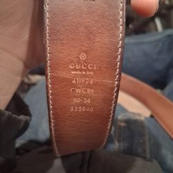 Gucci Interlocking GG leather belt in model 411924, featuring a 90/36 size