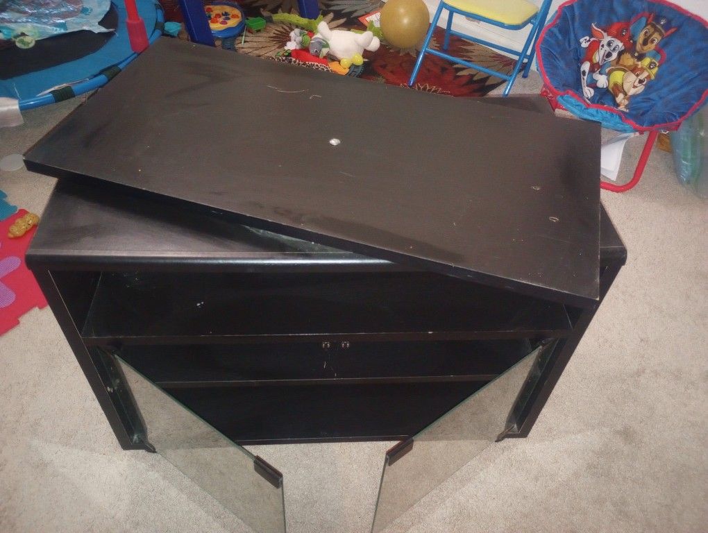 Small TV Stand. With Adjustable Top. And Two Shelves Glass Doors