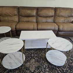 Brown leather Couch with 4 tables.