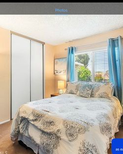 Full-sized bed with mattress, box spring and metal frame