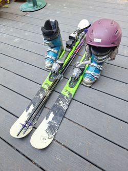 129cm twin tips k2 skis Nordica boots,24.5 poles and helmet