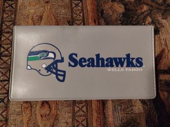 Vintage Seahawks themed promotional checkbook cover from Wells Fargo, 1995