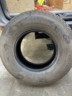 One Tire 245-75-16 E Rated