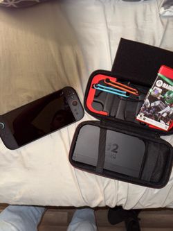 Nintendo switch 2 with case and Madden 26