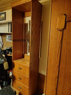 Murphy bed in great condition with a matching tall three drawer I don't even know what to call it but it matches the bed