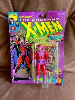 Vintage 1991 Toy Biz "The Uncanny X-Men" Magneto action figure, featuring magnetic hands and chest