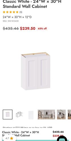24 x 30  white Shaker cabinet. Never opened. 2 available