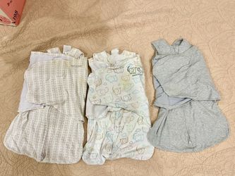 Halo sleep sack swaddles, newborn - 3 months, 2 have small stains. All 3 for $25