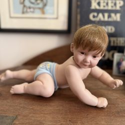 Adorable Porcelain Realistic Baby Boy Doll with Brown Hair 1994 Snug as a Bug