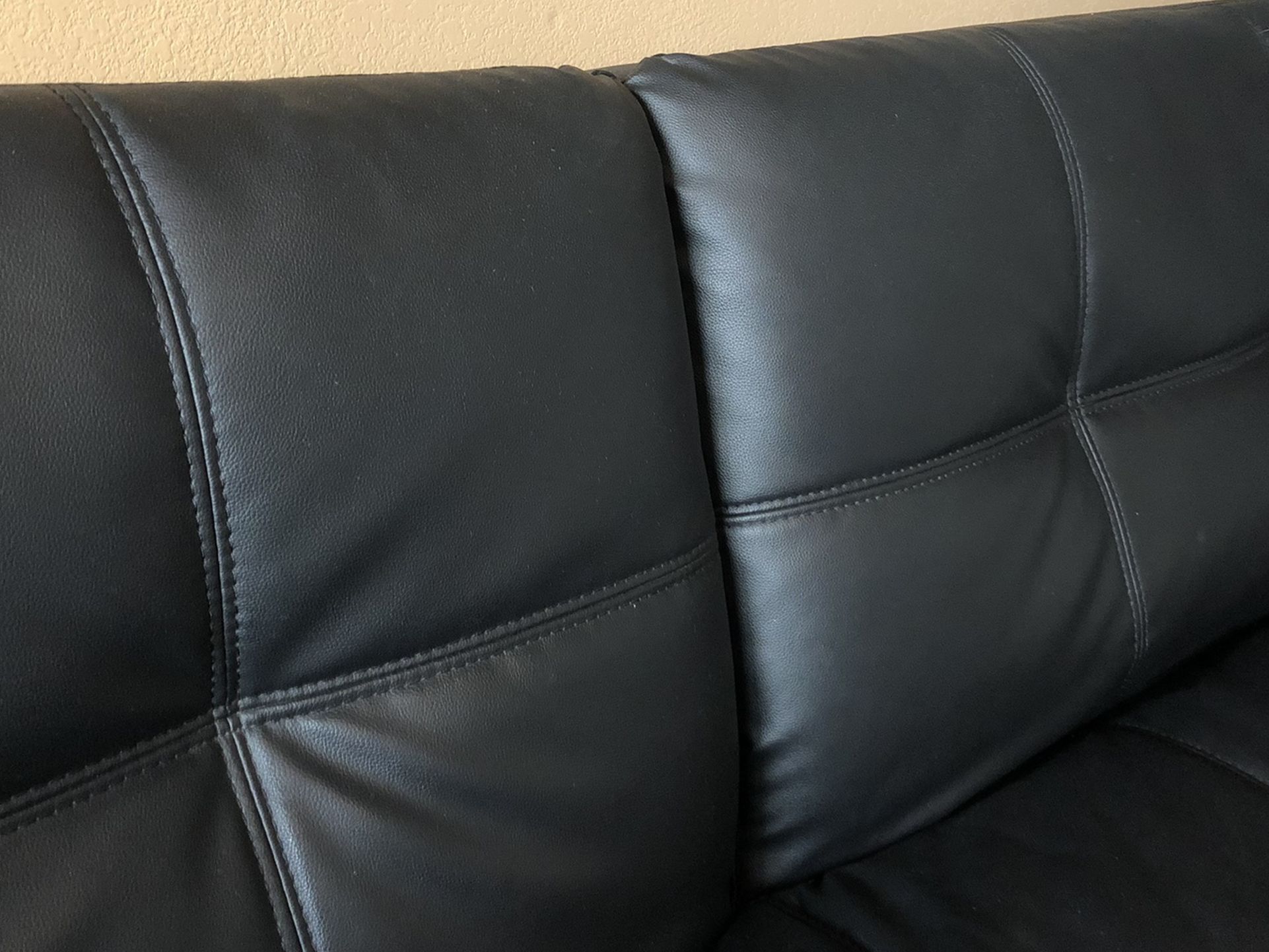 77” x 49” Black Leather Futon