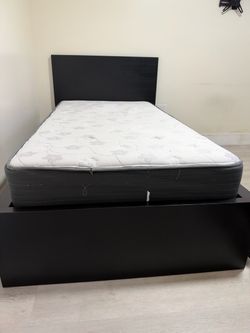 Twin bed with mattress