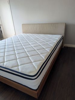 Cal king bed frame walnut trim, upholstered head board and mattress