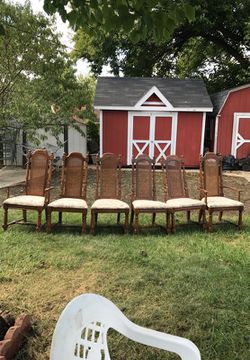 Six dining room chairs, two with arms