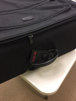 Tumi large suitcase
