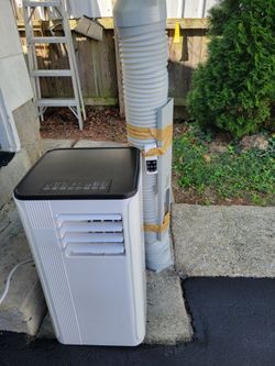 10,000 btu portable air conditioner like new.