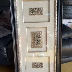 Framed wall art piece