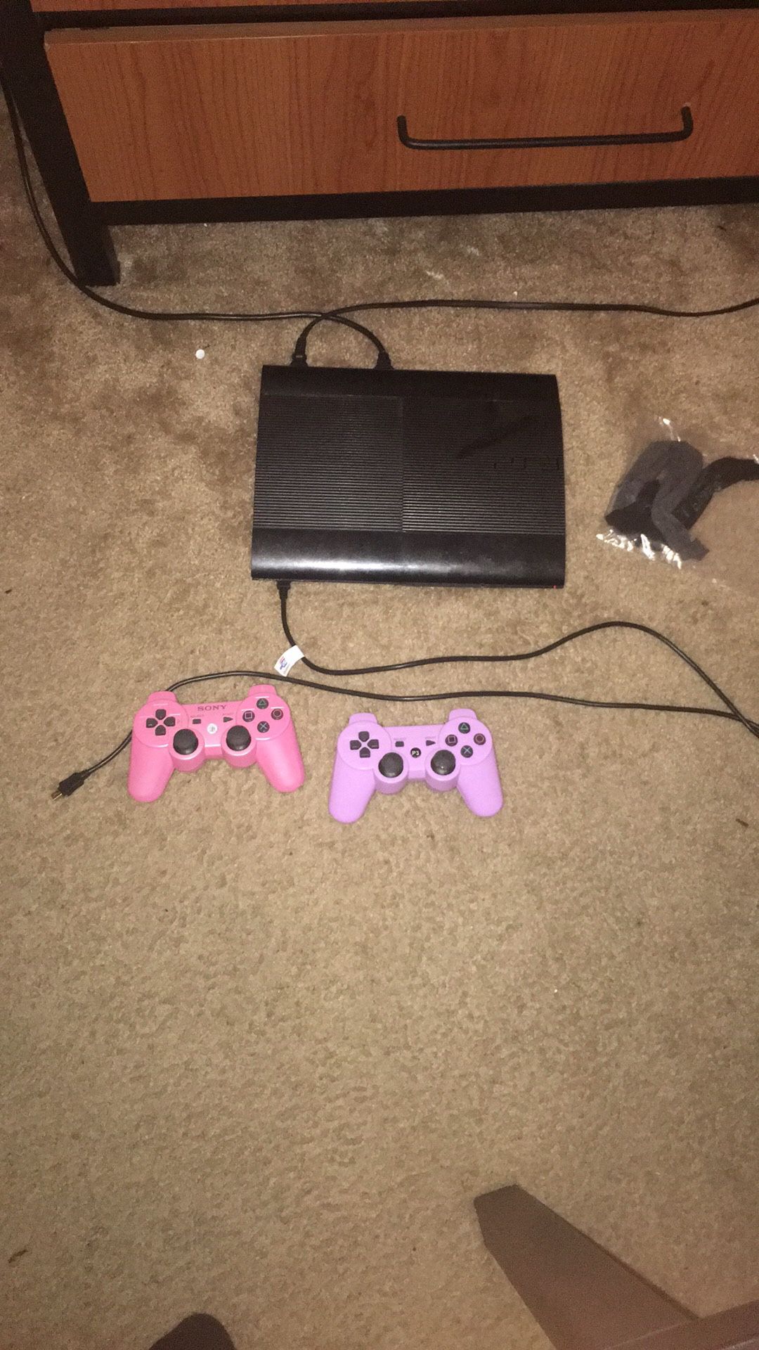 PS3 console with 1 remote and games