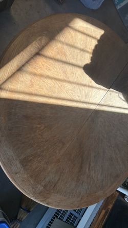 Round solid wood table