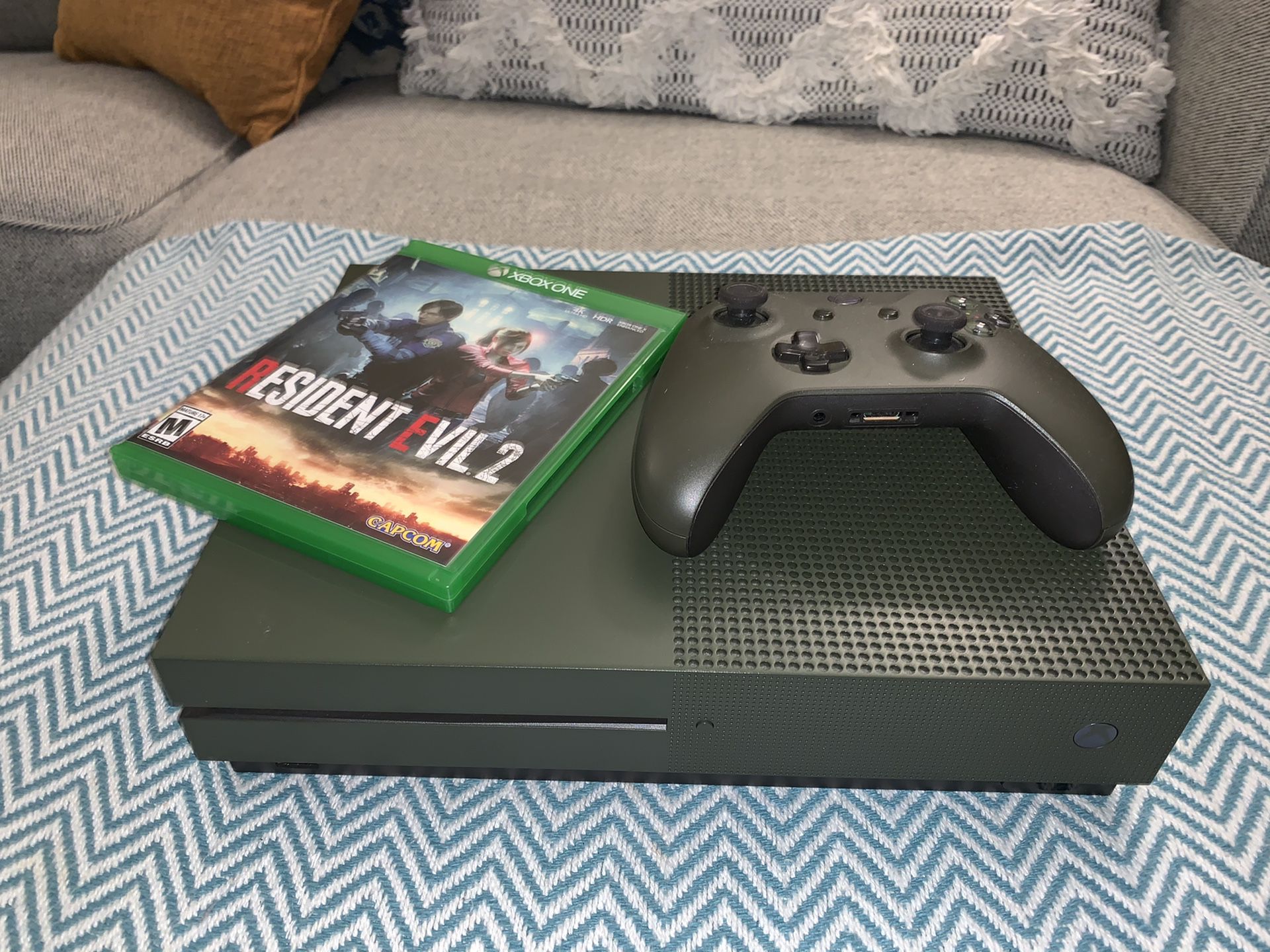 Microsoft Xbox One S Military Green Special Edition Console - 1TB Bundle. Including console, one wireless controllers , hdmi cable, and Resident Evil