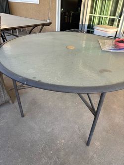 Glass top patio table