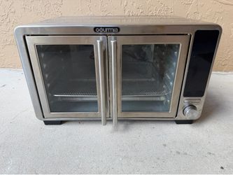 Gourmia XL Digital Countertop Oven with Air Fry featuring stainless steel construction and French doors