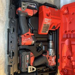 Milwaukee M18 FUEL 18V Lithium-Ion Brushless Cordless Hammer Drill and Impact Driver Combo Kit (2-Tool) with 2 Batteries 