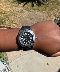 Small Men’s Invicta Watch black/silver with rubber watch band
