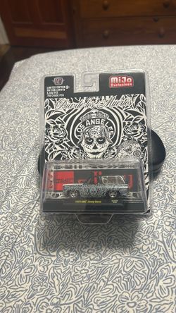 M2 Machines 1/64 scale MIJO exclusive Día de los muertos 1973 GMC Jimmy Sierra 