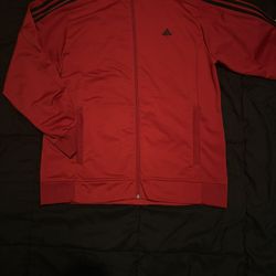 This is an Adidas Condivo 16 training jacket in red and black. 