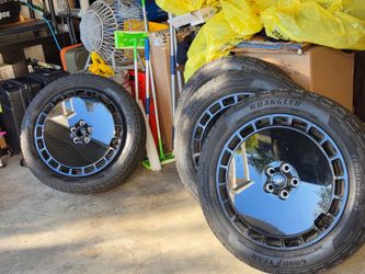 4 wheels and 3 good tires.