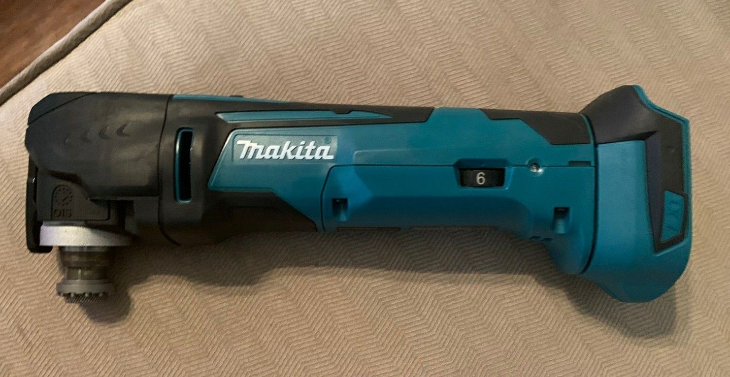Makita Oscillating Multi Tool XMT03 tool only 18V