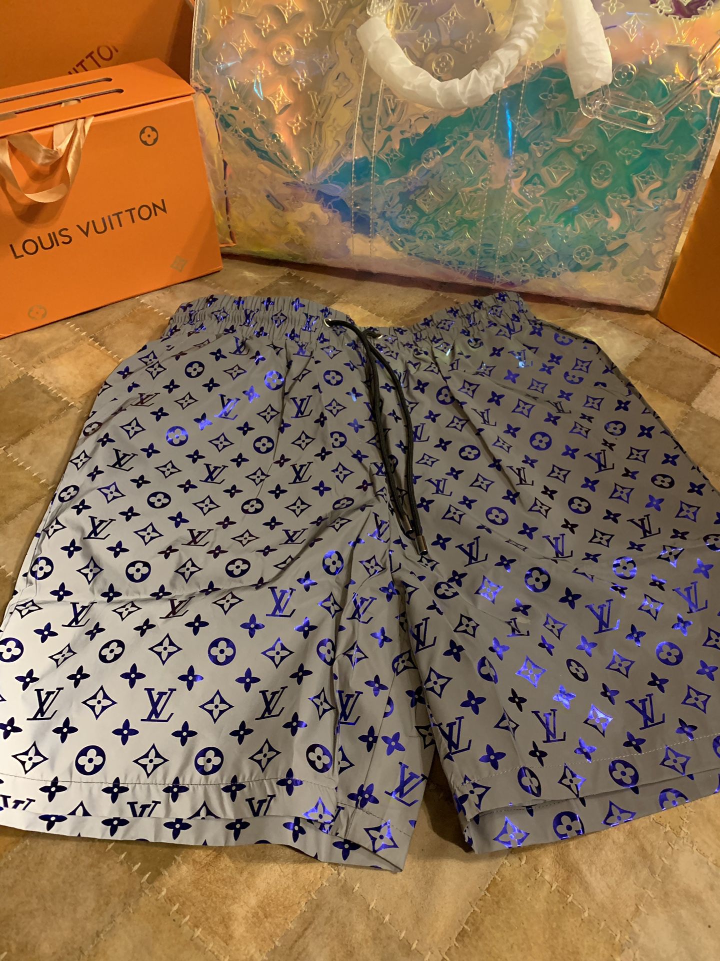 Louis Vuitton reflective monogram shorts/trunks (same shorts in each pic)  for Sale in Atlanta, GA - OfferUp