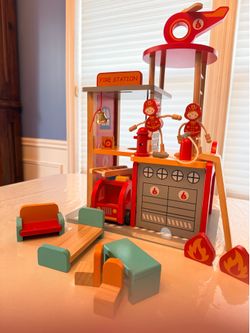 Wooden fire station (hape brand)
