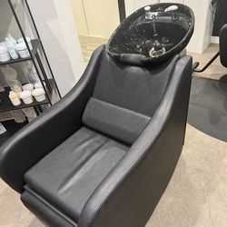 Black shampoo bowl with foot rest