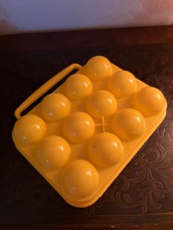 Yellow Coghlan's 12-Egg Holder, a portable plastic case