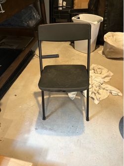 8 plastic black folding chairs