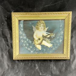 Baby Cherub with String Instrument In Gold Frame Wall Decor